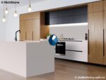 Бежевая кухонная столешница из акрилового камня с фартуком и мойкой фото