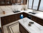 П-образная кухонная столешница из кварцевого агломерата с мойкой фото